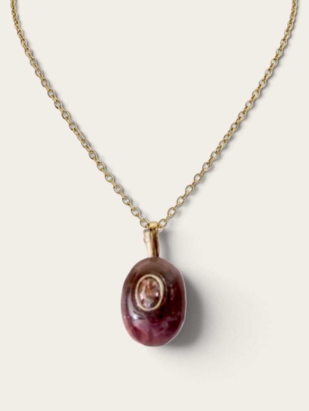 maroon natural stone pendant with embedded zirconia; .78"h x .4"w; nwot